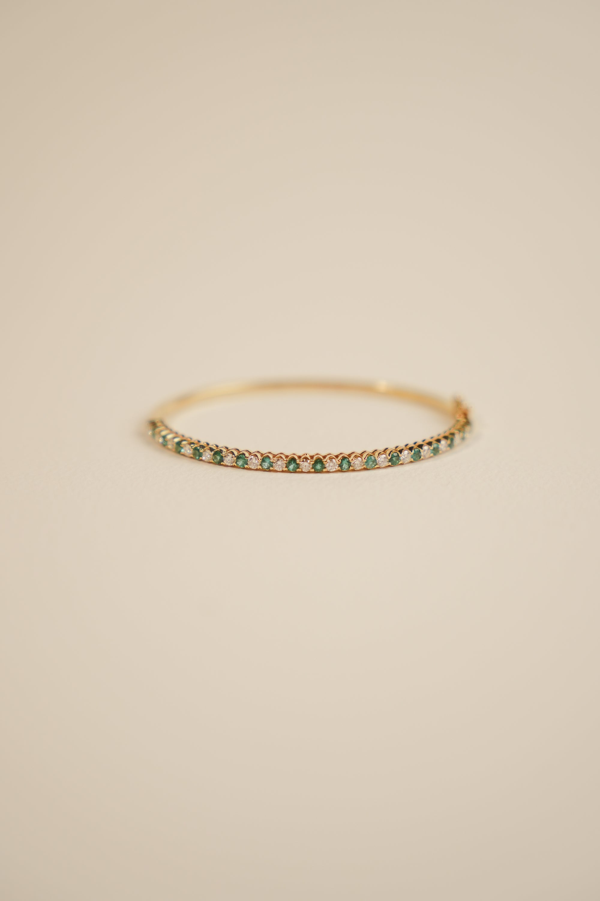 9kt White Diamond and Emerald Bangle