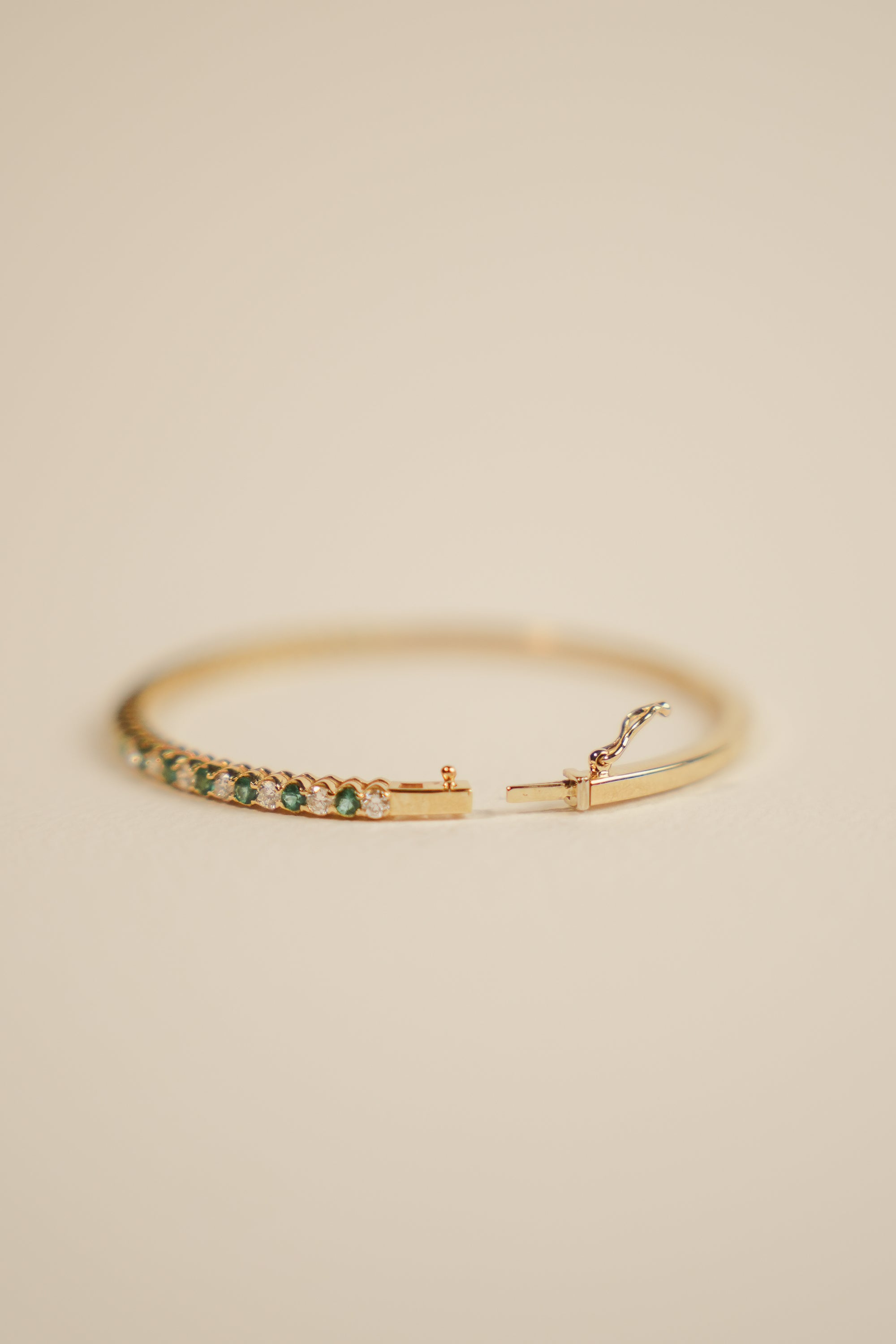 9kt White Diamond and Emerald Bangle